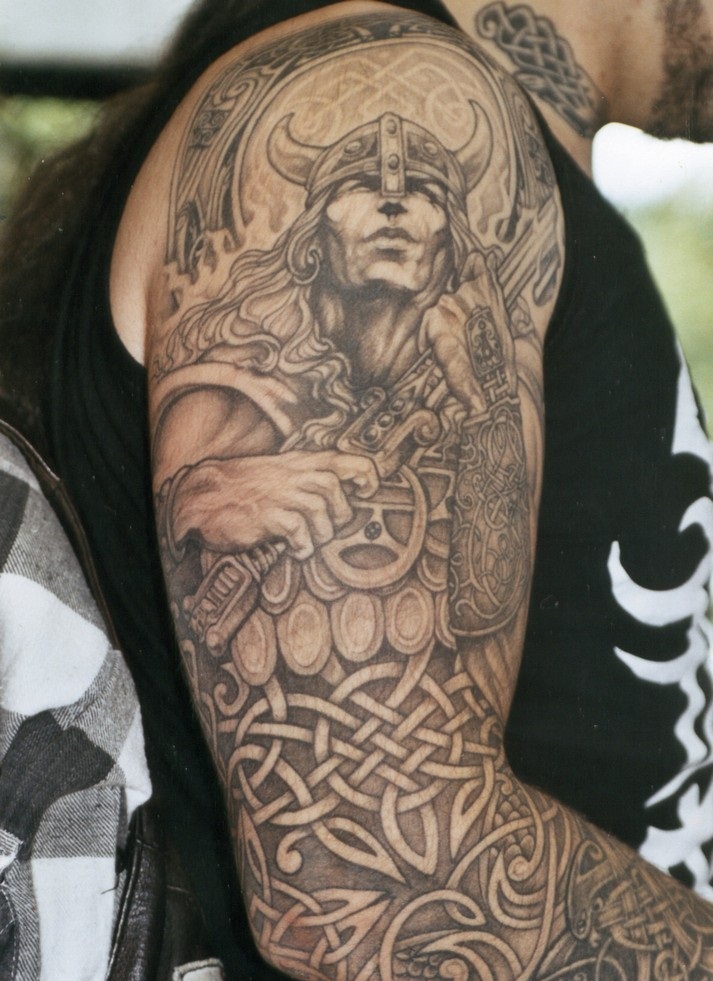 Celtic warrior sleeve tattoo
