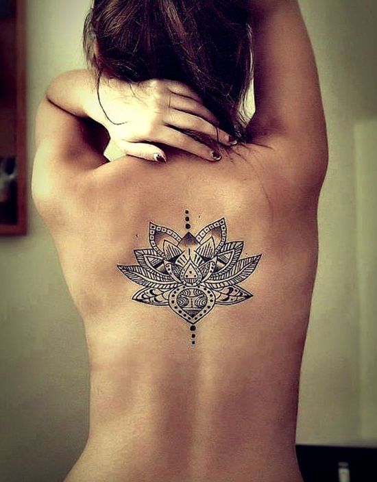 Lotus flower back tattoo