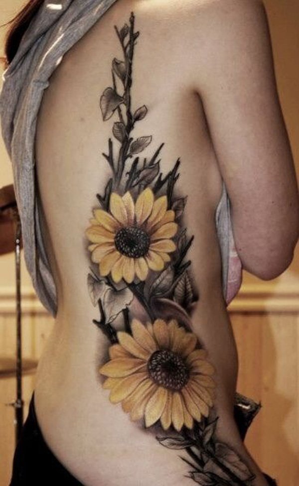 pink flowers side girl tattoo color ribcage rib by Jon von Glahn TattooNOW