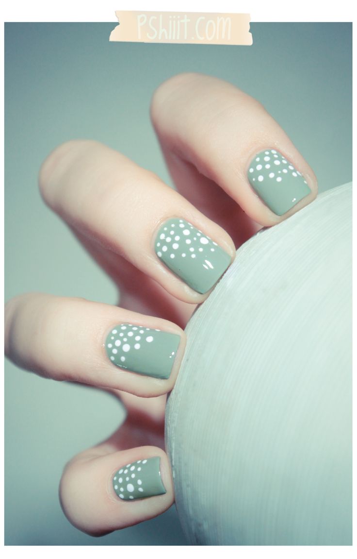 Chic white polka dots on monochrome nails