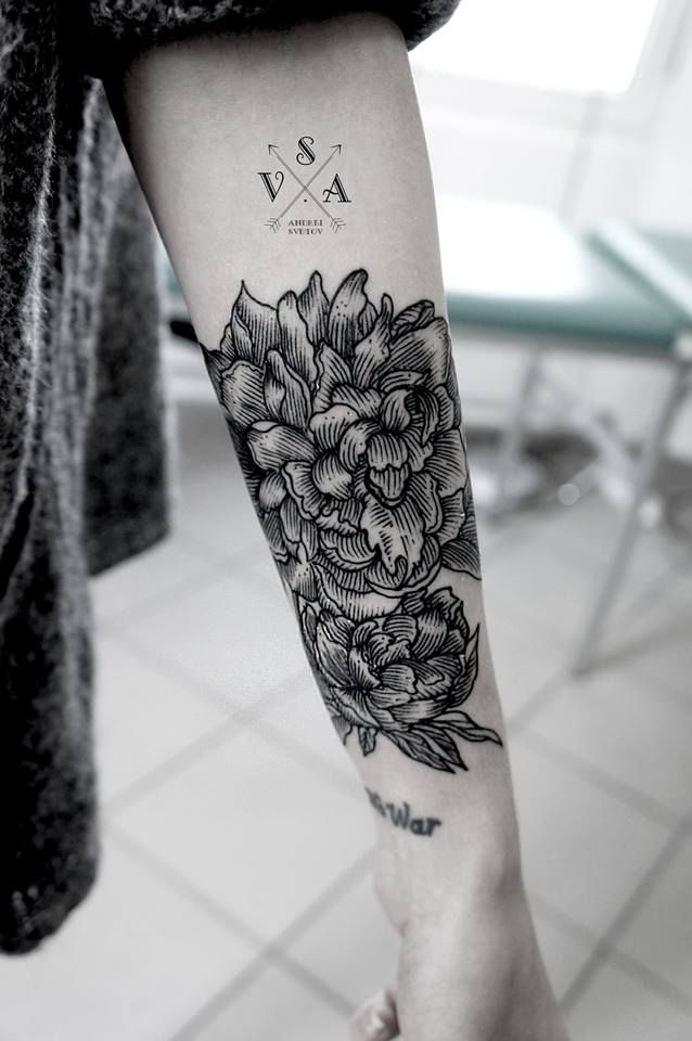 Flower forearm tattoo for women